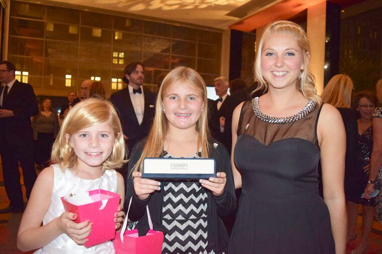 (From left) Molly Taft, Julia Luterman and Courtney Dotts at the Living Beyond Breast Cancer Butterfly Ball at the Loews Hotel in Philadelphia. (For the Inquirer/Maggie Henry Corcoran)