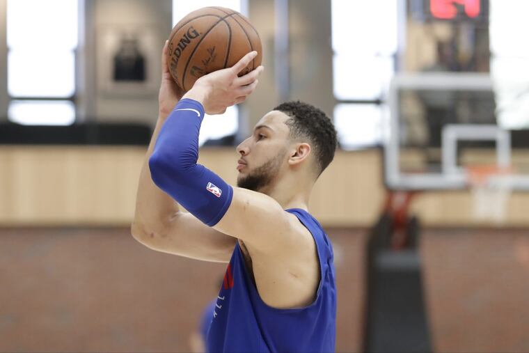 Sixers guard Ben Simmons shoots a free throw after practice in Lavietes Pavilion at Harvard University on Wednesday.