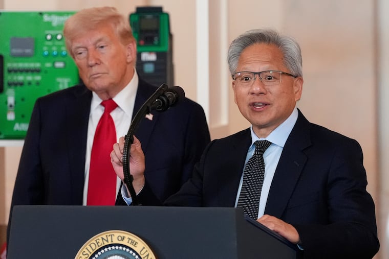 President Donald Trump listens as Nvidia CEO Jensen Huang speaks during an event at the White House in April.