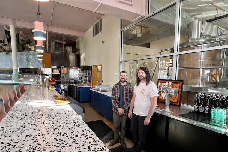 Owners Kyle Wolak (left) and Brendon Boudwin at the first Carbon Copy location in West Philadelphia.