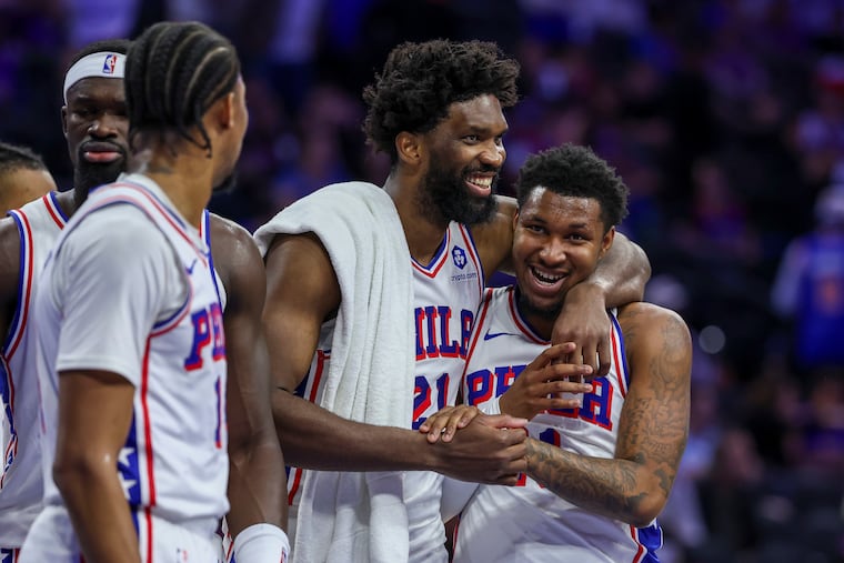 Sixers center Joel Embiid gathered with his teammates after their fate had been decided in Game 4 of the second-round series.