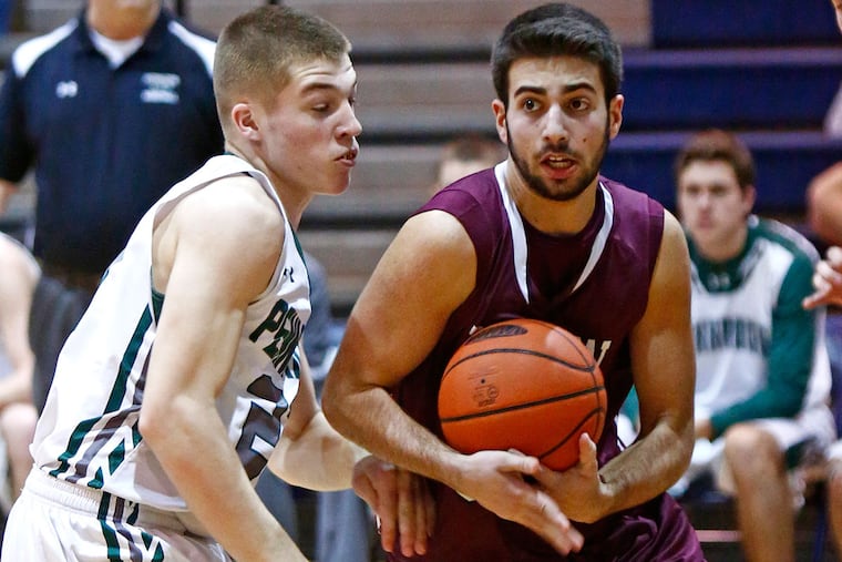 Abington's Jack Steinman tries to regain control of the ball as he drives past Pennridge's Kyle Yoder in the first quarter. Abington went on to win, 59-51, Saturday (2/6/16) in the Suburban One League boys' basketball semifinals at Council Rock North.