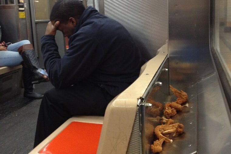 Discarded chicken bones are seen on the Broad Street Line in 2013. It's a testament to gross urban living.