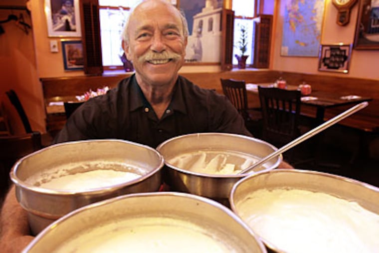 Tom Vasiliades, owners of South Street Souvlaki, makes his own yogurt. (DAVID MAIALETTI / Staff Photographer)