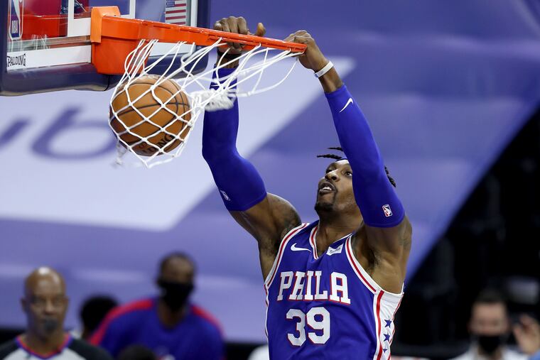 Dwight Howard of the SIxers dunks against the Heat during the 1st half of an NBA game at the Wells Fargo Center on Jan. 12.