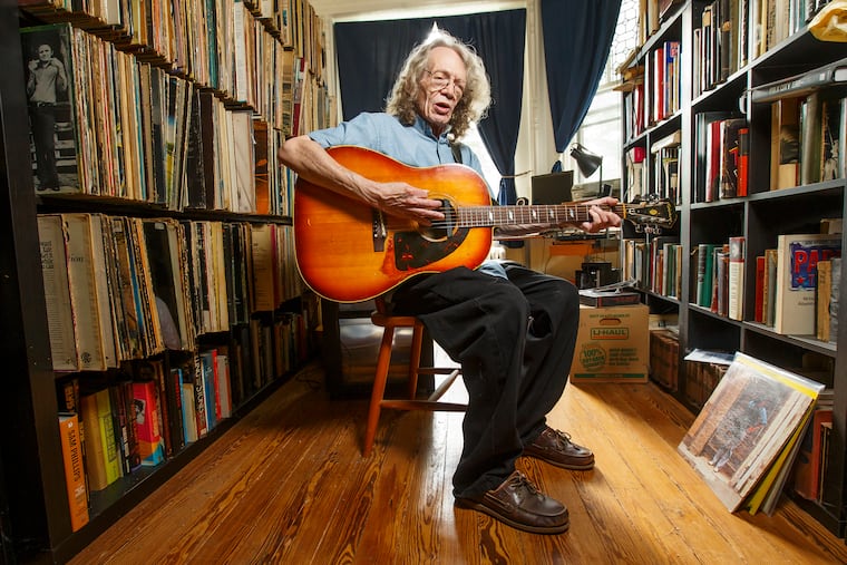 Peter Stone Brown, a mainstay on the Philly music scene, plays a Bob Dylan song on his 1965 Epiphone Texan guitar in his West Mount Airy apartment.