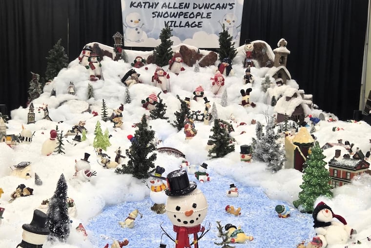Kathy Allen Duncan’s family created a snowman exhibit in her honor at a mall in Topeka, Kan.