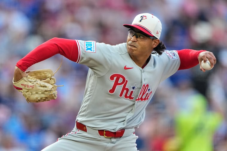 Philadelphia Phillies starting pitcher Jesus Luzardo throws during the first inning of a baseball game against the Kansas City Royals, Saturday, July 4, 2026, in Kansas City, Mo. (AP Photo/Charlie Riedel)