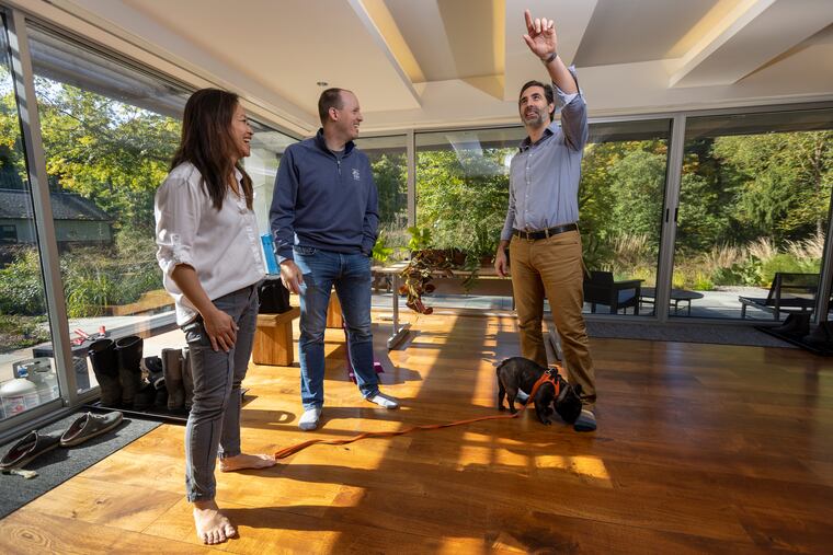 Jasmin Fung (left) and Steve Lyons spent 10 years renovating their home in Gladwyne with the help of architect Adam Montalbano (right).