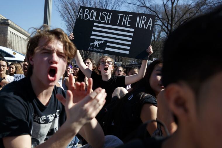 Sydney Acuff, 16, of Silver Spring, Md., center, screams during a student protest for gun control legislation in front of the White House, Wednesday, Feb. 21, 2018, in Washington. (AP Photo/Evan Vucci)