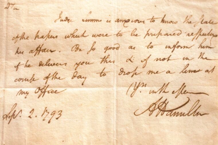 A letter from Alexander Hamilton to William Rawle, dated Sept. 2, 1793 displayed in a conference room at the law firm of Rawle & Henderson Chestnut St., Philadelphia. ( DAVID M WARREN / Staff Photographer )