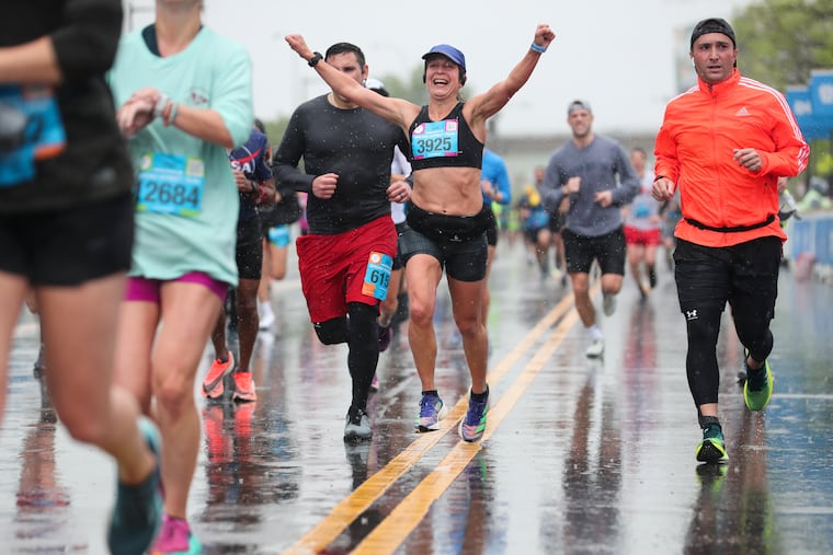 Runners approach the finish line in the Independence Blue Cross Broad Street Run on 11th Street in South Philadelphia, Pa. on Sunday, April 30, 2023.