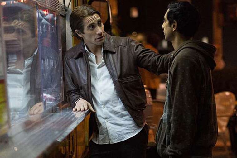 Jake Gyllenhaal as photographer Louis Bloom, Riz Ahmed as his assistant Rick in the Dan Gilroy-helmed and -scripted thriller.
