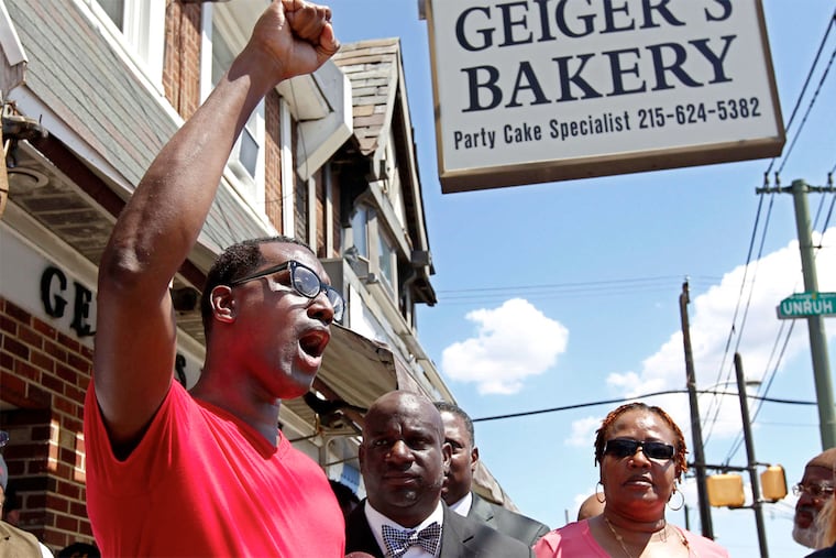Asa Khalif , shown speaking in August at the spot where his cousin Brandon Tate-Brown was shot by police last December, heads the Pennsylvania chapter of Black Lives Matter.