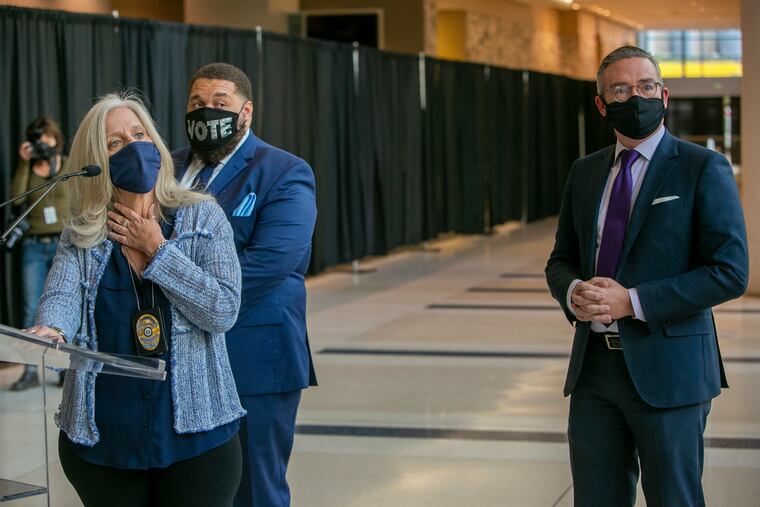 City Commissioners Lisa Deeley (left), Al Schmidt (right), and Omar Sabir at a November press conference.