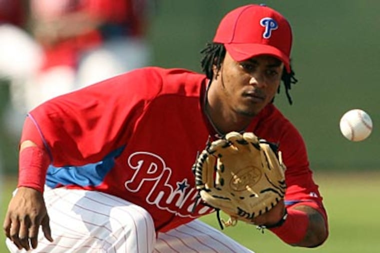 Phillies' prospect Michael Martinez fields the ball at Bright House Field. (Yong Kim/Staff Photographer)