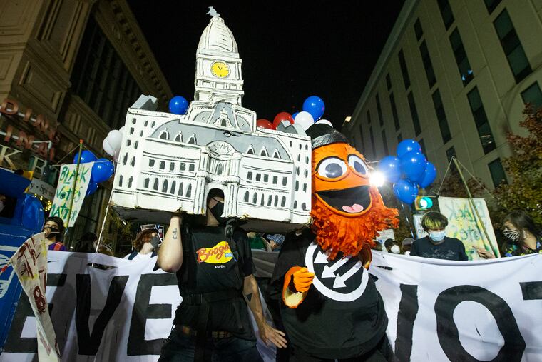 A dancing City Hall and a person in a Gritty costume danced together on Nov. 5, as Philadelphia reveled in the national spotlight during the presidential election.
