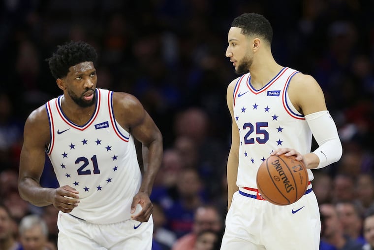 It's clear that Joel Embiid, left, sees himself as the sun, and Ben Simmons as a planet that orbits around him.