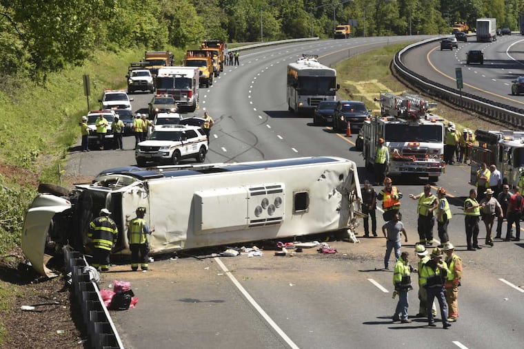 Crews respond to the scene of a serious bus crash on Interstate 95 in Harford County, Md., on Monday. The charter bus was carrying students and chaperones from the C.W. Henry School in West Mount Airy.