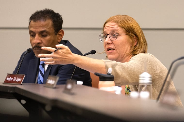 Superintendent Tony B. Watlington Sr. and Board of Education vice president Mallory Fix-Lopez during a 2023 discussion considering revoking the charter of Franklin Towne Charter School.