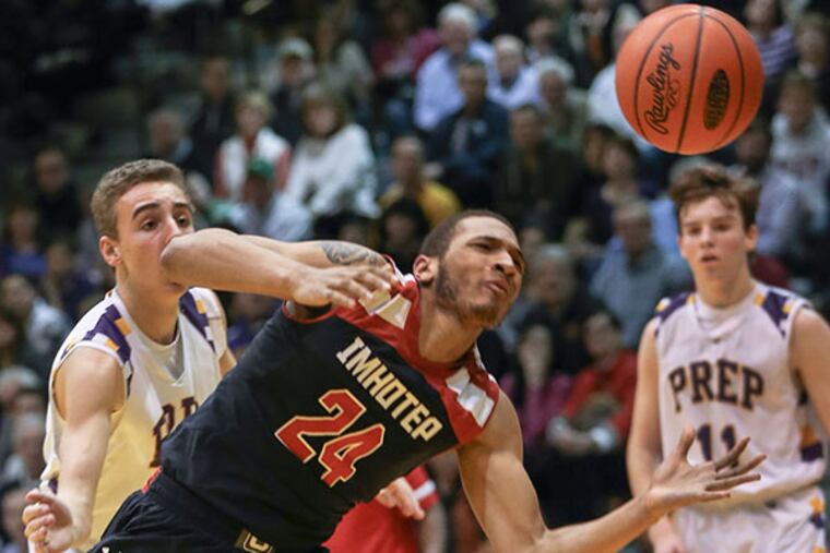 Imhotep Charter's Devin Liggeons gets fouled by Scranton Prep's Logan Bailey during the 4th quarter of the PIAA District 1 AAA second round boy's basketball at Bethlehem Freedom, Tuesday, March 10, 2015. Imhotep beats Scranton Prep 77-54. (Steven M. Falk/Staff Photographer)