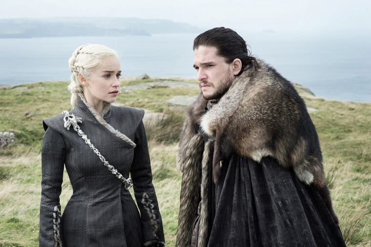 Emilia Clarke (left) and Kit Harington in a scene from “Game of Thrones.”