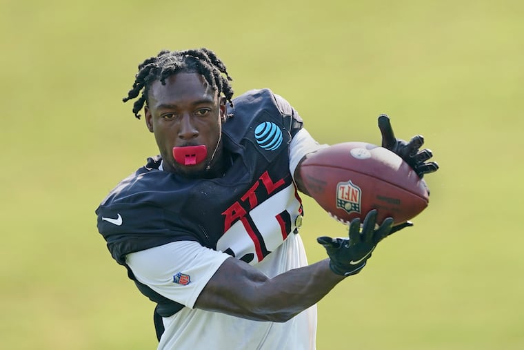 Atlanta Falcons wide receiver Calvin Ridley catches a football during the team's NFL training camp practice in 2021, in Flowery Branch, Ga.