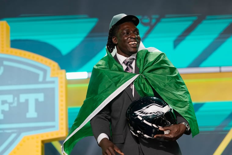 International Player Pathway athlete Uar Bernard celebrates after being chosen by the Philadelphia Eagles with the 251st overall pick during the final day of the NFL draft.