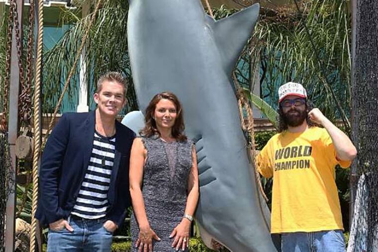 "Sharknado" Lives! Mark McGrath, Kari Wuhrer, and Judah Friedlander (from left) help announce "Sharknado 2" at a Syfy press conference. (Scott Everett White/NBC)