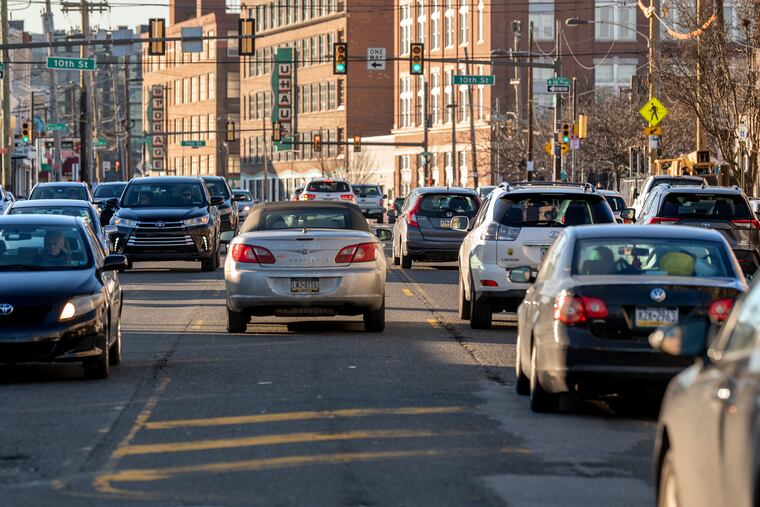 The 900 block of Washington Avenue on Feb. 6, 2022. City transportation officials said in February 2022 that the three-lane option — unveiled in 2020 as its final design for the notorious five miles of road — is now "off the table."