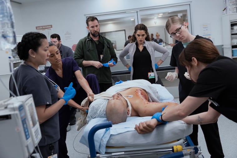 "The Pitt" is known for showing realistic portrayals of medical procedures, and now adds cyberattacks to its repertoire. From left: Kristin Villanueva, Alexandra Metz, Noah Wyle, Sepideh Moafi, Taylor Dearden, and Fiona Dourif. MUST CREDIT: Warrick Page/HBO Max