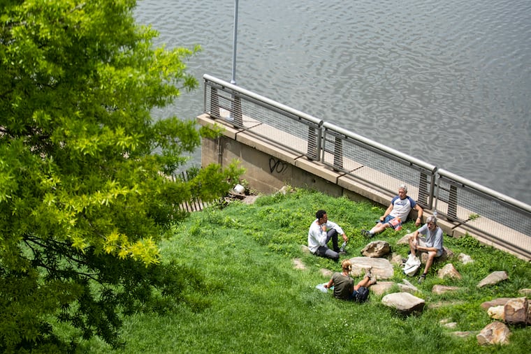 People gather off the Schuylkill Banks Trail. Philadelphia and its surrounding counties are set for $322 million in federal and state funding for new trail segments and safety improvements for fiscal year 2027.