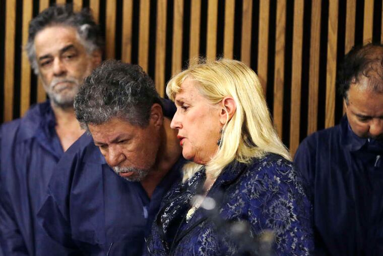Ariel Castro , accused of kidnapping three women and holding them captive for years, was in a Cleveland court Thursday with his lawyer, Kathleen DeMetz. He was ordered jailed on $8 million bail. DAVID DUPREY / AP