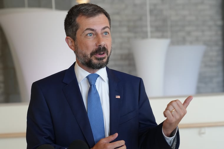 Former Transportation Secretary Pete Buttigieg talks to reporters after speaking at the South Carolina Democratic Party's Spratt Issues Conference, Saturday, Aug. 22, 2026, in Florence, S.C.