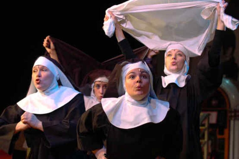 Kara Boyer (center) shown during a dress rehearsal for "Nunsense" at the Devon Theater.