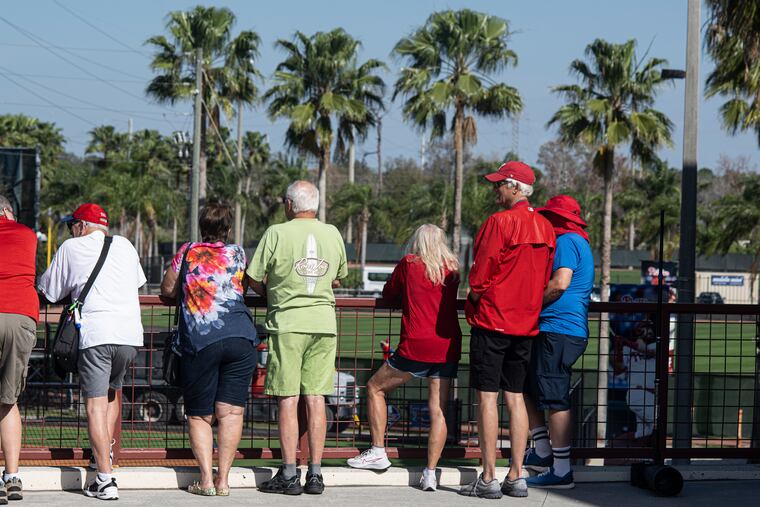 The Phillies' complex in Clearwater, Fla., is open for business again as fans watch Wednesday's activities.