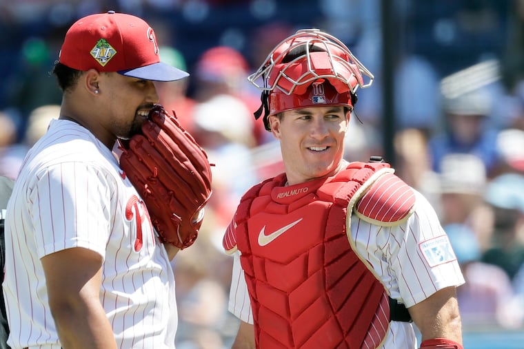 Phillies catcher J.T. Realmuto (right) and closer Jhoan Duran are closing in on returning from the injured list.