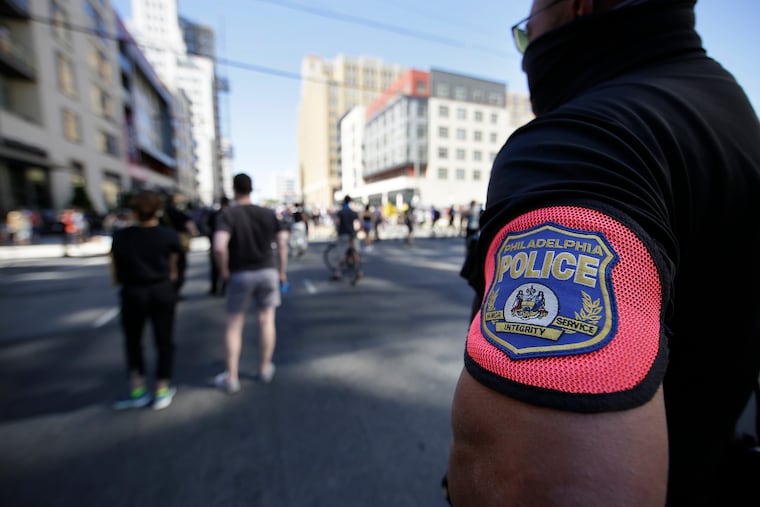 The budget likely includes cuts to police overtime and a reduction of officers through attrition.