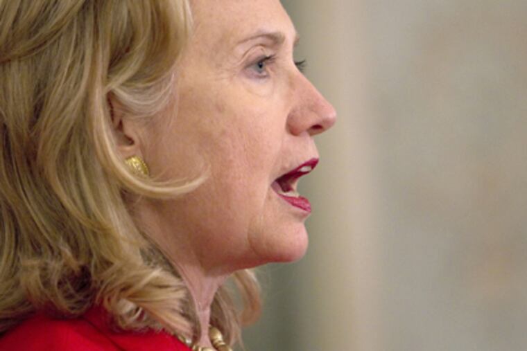Secretary of State Hillary Clinton will decide if MEK should be off a list of banned groups. (Evan Vucci / Associated Press)