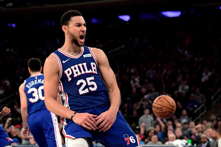 Ben Simmons (25) celebrates his second-half dunk during the Sixers' 101-95 win over the Knicks on Friday at Madison Square Garden.