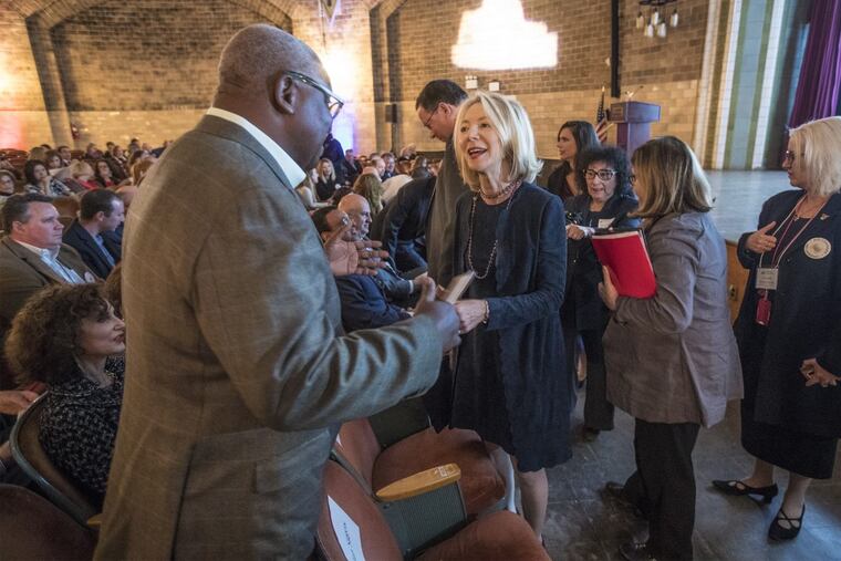 University of Pennsylvania president Amy Gutmann speaks to Osagie Imasogie, a business executive and adjunct law professor.