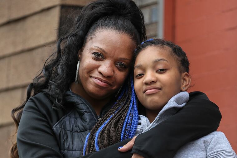 Melony Holmes and her 10-year-old daughter Mahy'di Holems who she almost lost custody of.