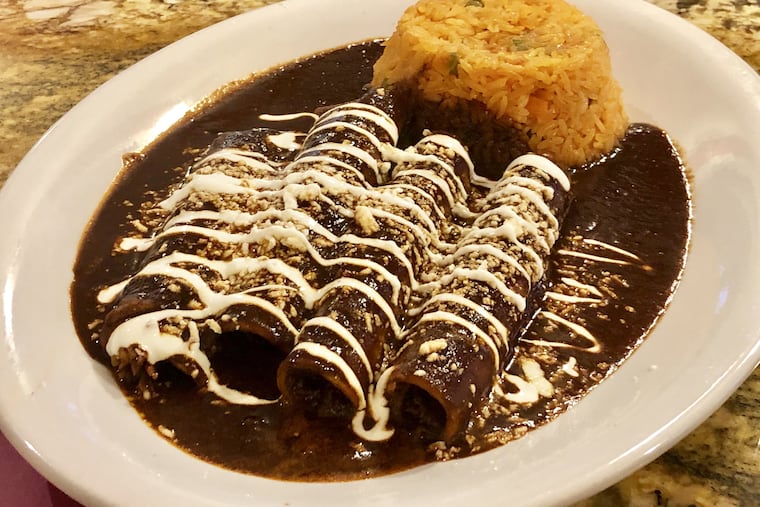 Chicken enchiladas in mole sauce at El Nuevo Mariachi Loco in Hammonton, N.J.