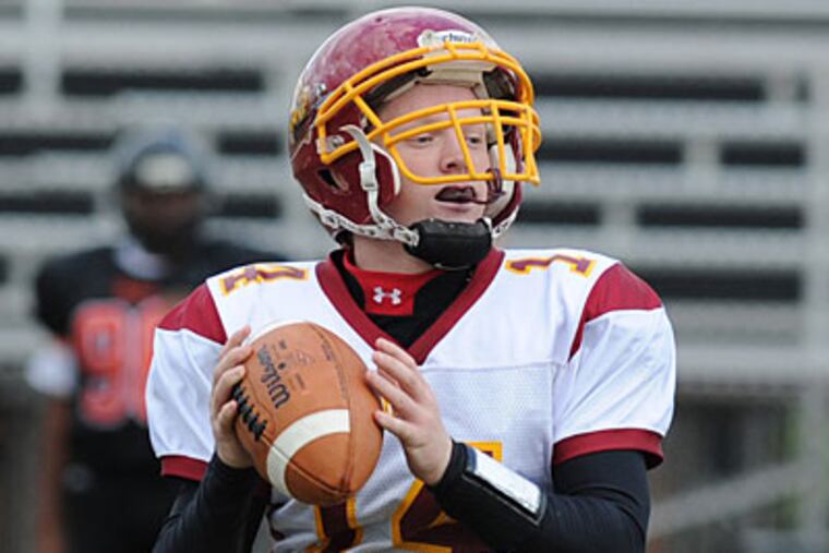 Central quarterback Ryan Dydak completed eight of 11 attempted passes for 87 yards. (Sarah J. Glover/Staff Photographer)