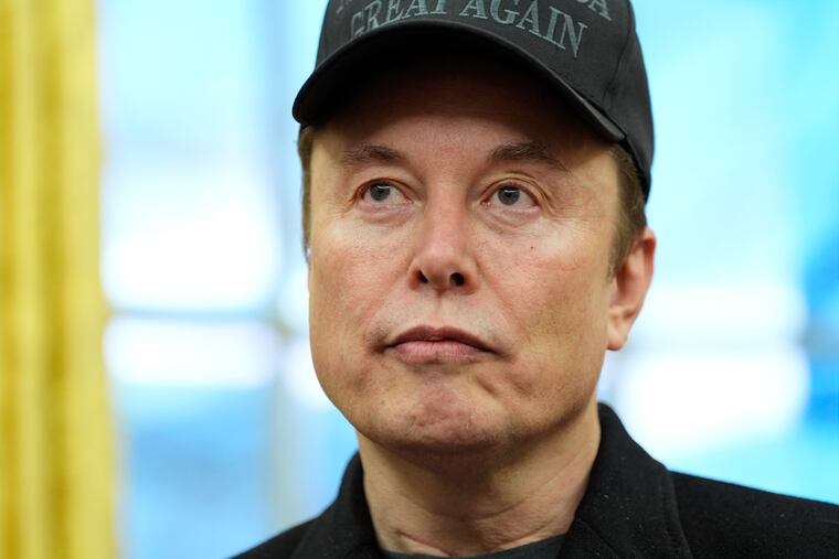 Elon Musk speaks during an event in the Oval Office with President Donald Trump at the White House on Feb. 11.