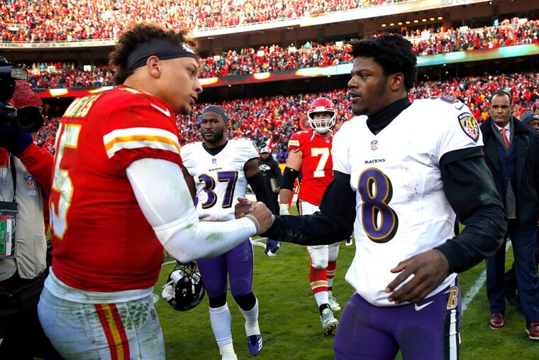 Quarterback Patrick Mahomes of the Kansas City Chiefs shakes hands with quarterback Lamar Jackson of the Baltimore Ravens in December 2018.