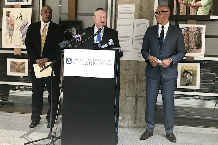 Mayor Kenney announces a pilot program to put full-time social workers in 22 city schools. He was joined by David T. Jones (left), commissioner of Philadelphia's Department of Behavioral Health, and Superintendent William R. Hite Jr. of the School District.