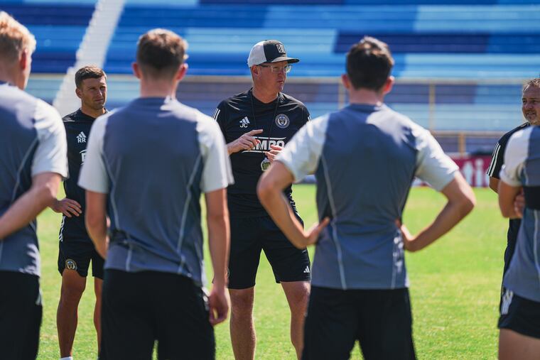 Union manager Jim Curtin (center) talking with his players at practice the day before their Champions League game at Alianza.