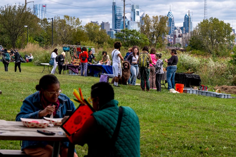 The Philadelphia skyline is the backdrop for the 13th Annual Philadelphia Indigenous Peoples Day Celebration on the meadow at Bartram’s Garden Sunday, Oct. 8, 2023. This year, Indigenous Peoples' Day is Oct. 13. Find out what's open and closed.