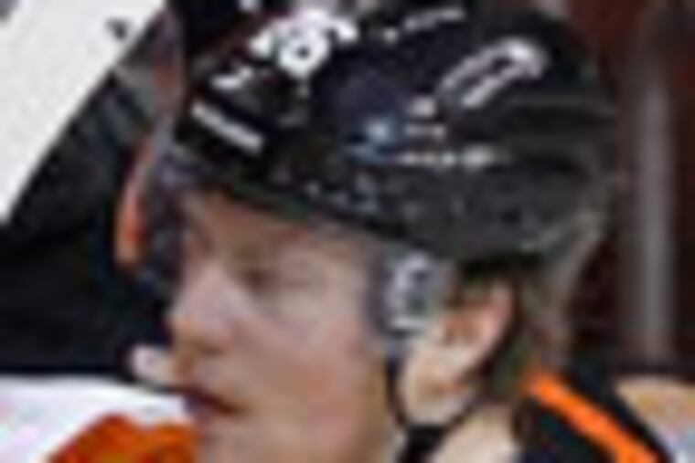 Flyers' Erik Gustaffson (right) celebrates his second period goal with the Flyers bench against the Pittsburgh Penguins in game six of the Eastern Conference quarterfinals on Sunday, April 22, 2012. ( Yong Kim / Staff Photographer )